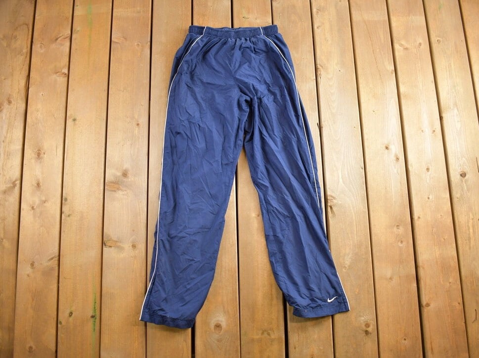 Vintage 1990s Nike Mini Swoosh Track Pants Size S
