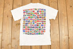 Vintage 1990s Compassion As A Lifestyle Souvenir Multi Flag FAB T-Shirt Men's S