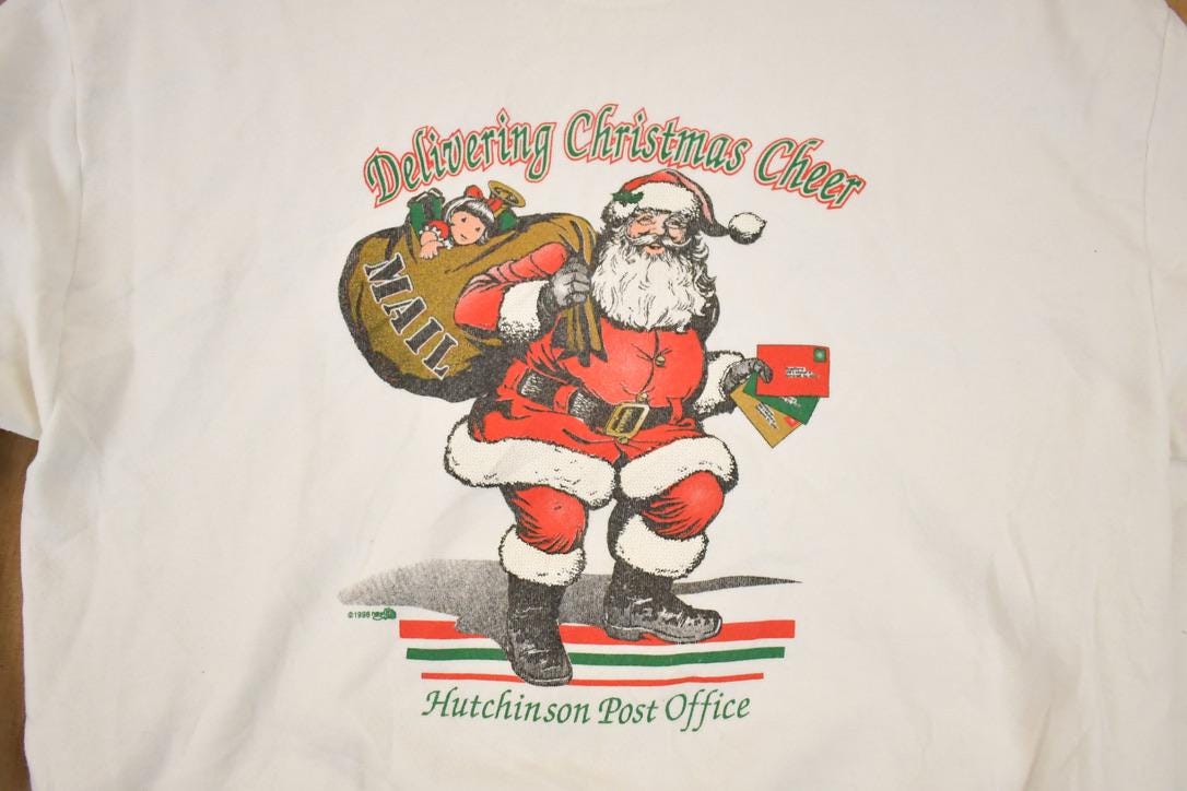 Vintage 1990s Delivering Christmas Cheer Graphic Print Santa Crewneck Sweatshirt Mens L
