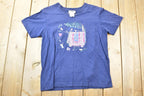 Vintage 1990s Northern Reflections Bird And Blanket Theme Graphic T-Shirt