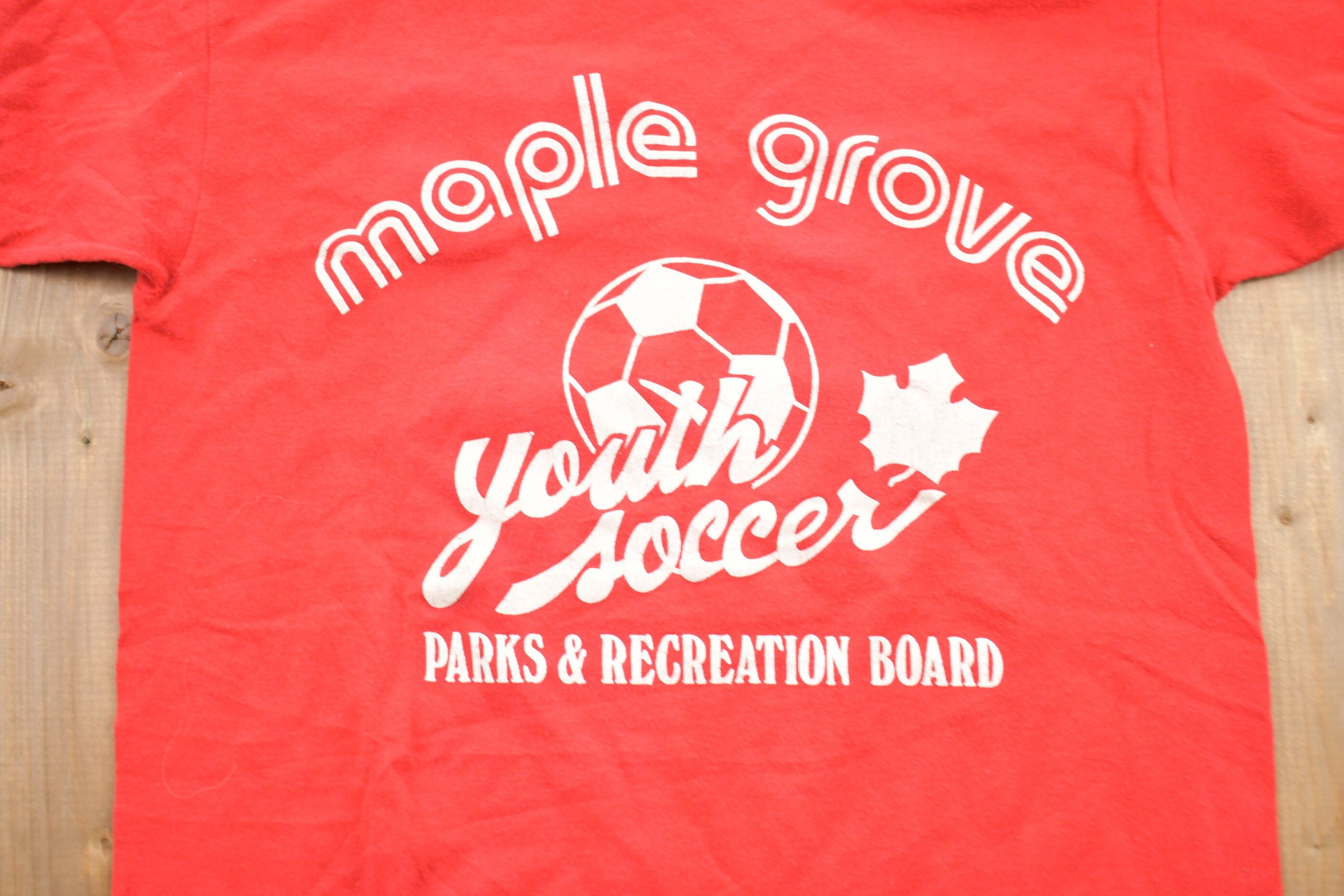 Vintage 1980s Kids Russell Athletic Maple Grove Soccer Graphic T-Shirt