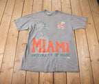 Vintage 1990s University Of Miami Hurricanes Collegiate Graphic T-Shirt Size XL