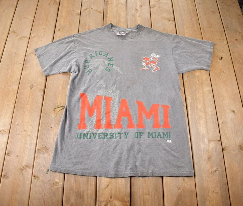 Vintage 1990s University Of Miami Hurricanes Collegiate Graphic T-Shirt Size XL