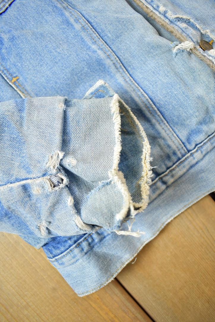 Vintage 1990s Distressed Faded Wrangler Synthetic Fur Lined Jean Jacket