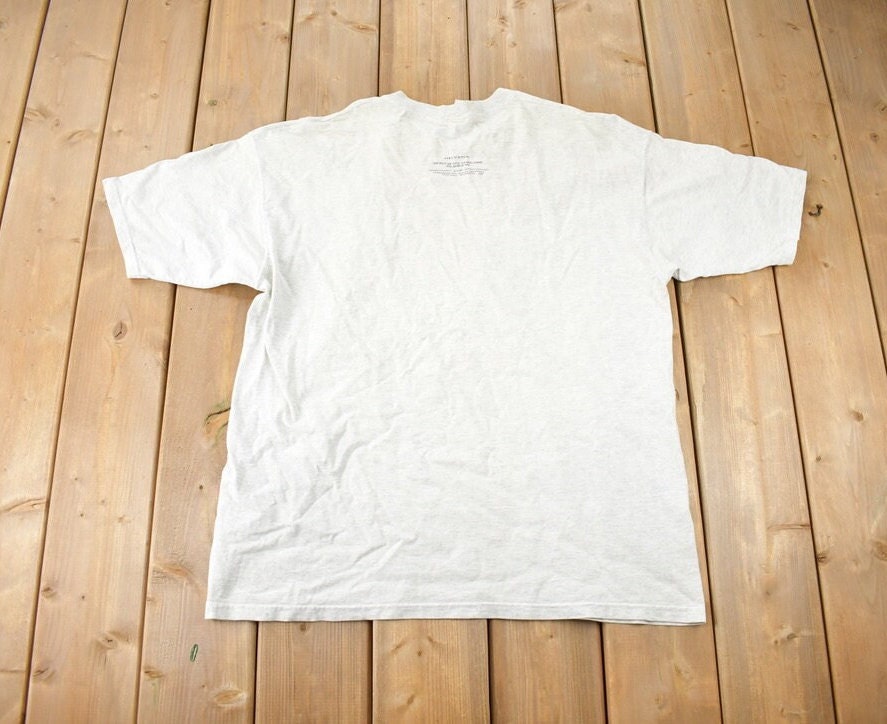 Vintage 1997 Helvetia Bold Art Deco Air Mail Stamp Graphic T Shirt Made In USA