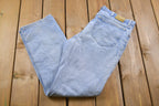 Vintage 1990's Lee Blue Light Wash Knee Distressing Jeans 32 x 32