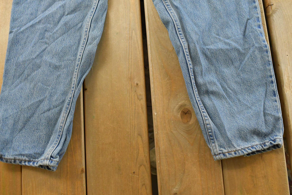 Vintage 1990s Levi's 560 Loose Fit Denim Blue Jeans Size 30 x 32 / 90s Levi's / Distressed Sun Faded Jeans / Made in USA / Streetwear