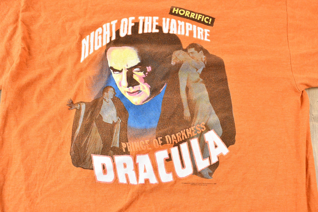 Vintage 2005 Dracula Night of the Vampire Orange and Blue Ringer Graphic T-Shirt