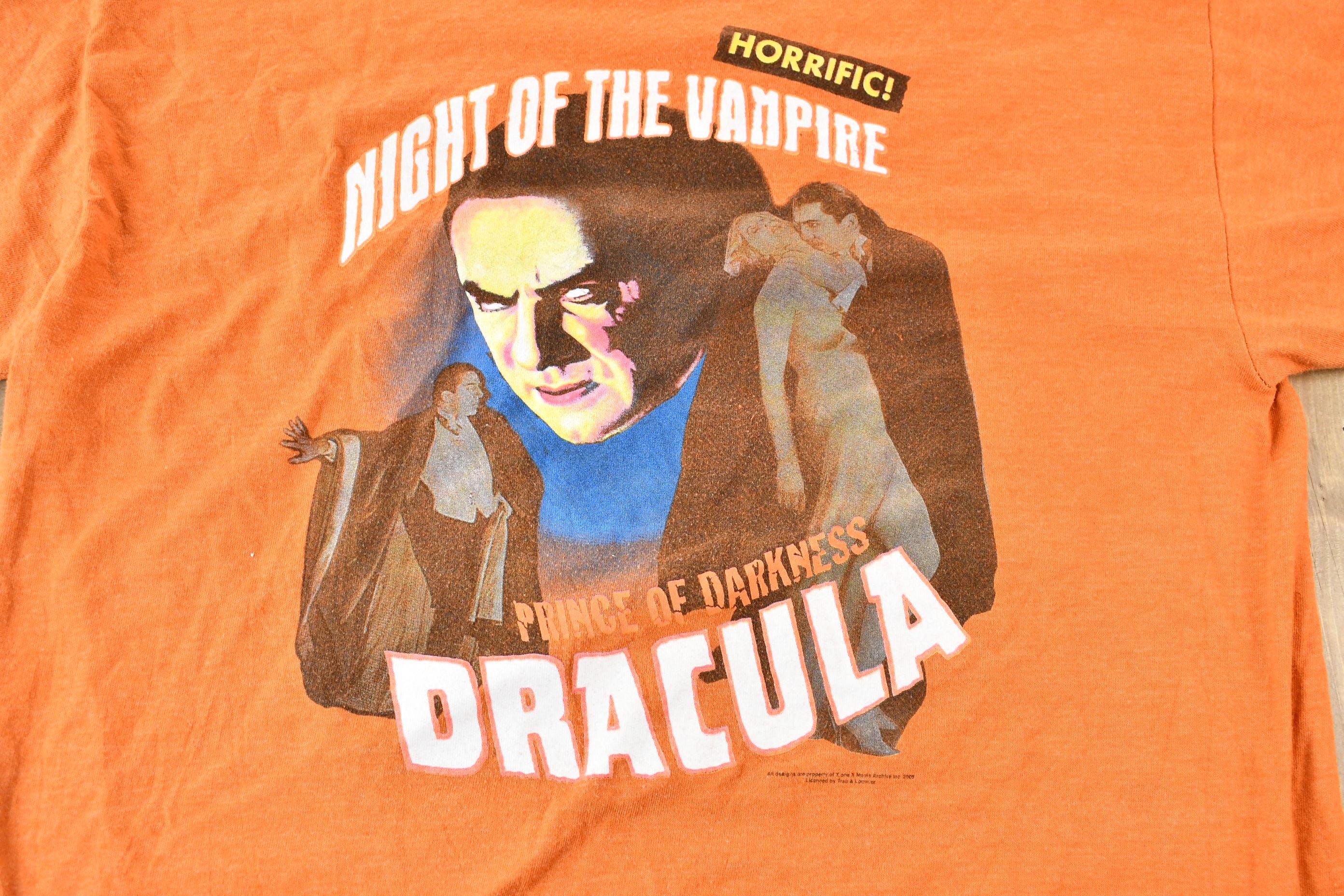 Vintage 2005 Dracula Night of the Vampire Orange and Blue Ringer Graphic T-Shirt