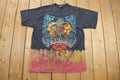 Vintage 1990s FEARLESS All Over Print Skull Graphic T-Shirt