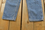 Vintage 1990s Levi's 550 Regular Fit Denim Blue Jeans Size 22 x 24.5 / 90s Levi's / Distressed Sun Faded Jeans / Streetwear