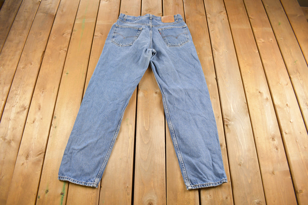 Vintage 1990s Levi's 550 Medium Wash Denim Jeans Size 34 x 31