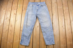 Vintage 1990s Levi's 550 Red Blank Tab Denim Jeans Size 32 x 29