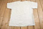 Vintage 1990s Milkovich Wrestling Conference Champions Graphic T Shirt