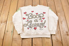 Vintage 1990s Betty Boop " You Go Girl" All Over Print Crewneck Sweatshirt Made in USA