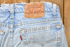 Vintage 1990s Perfectly Distressed Levi's 550 Light Wash Jeans