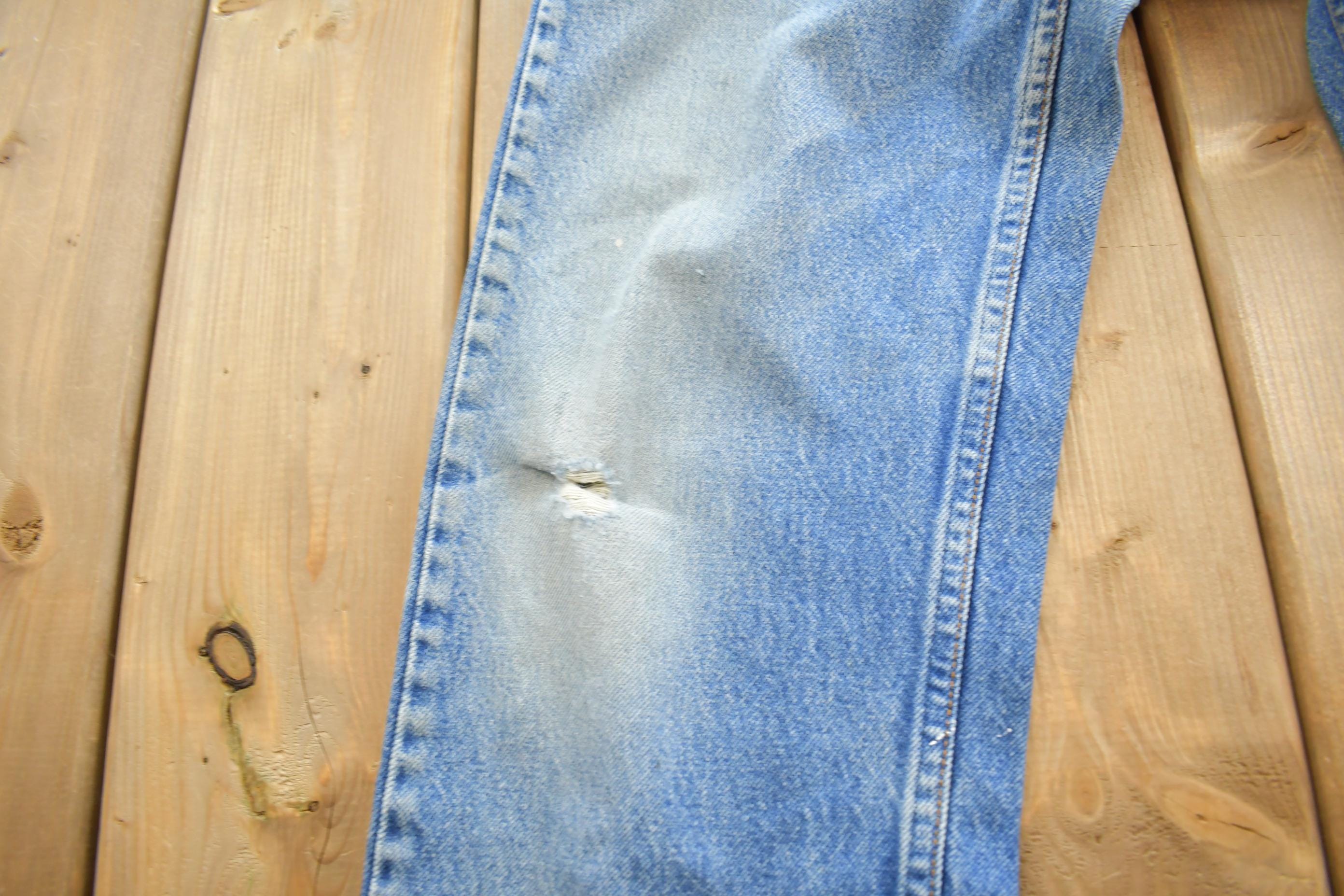 Vintage 1990s Levi's 550 Orange Tab Jeans Size 32x30