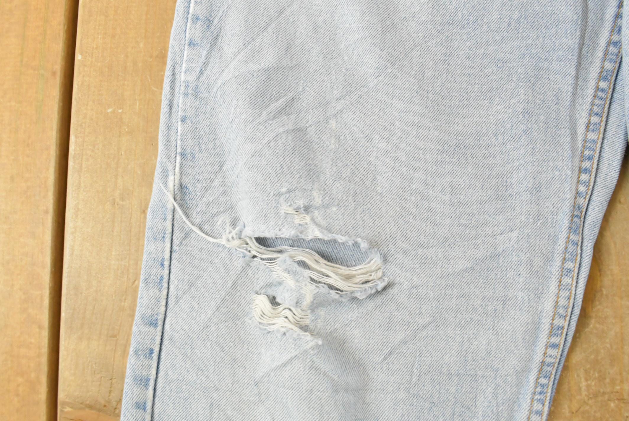 Vintage 1990s Levi's Distressed 550 Relaxed Fit Denim Jeans Men's 33 x 33 / 90s Levi's / Blown Out Sun Faded Jeans