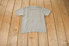Vintage 1990s KillBuck Elementary Where A Kid Can Be A Kid Single Stitch Graphic Baby T Shirt Made In USA
