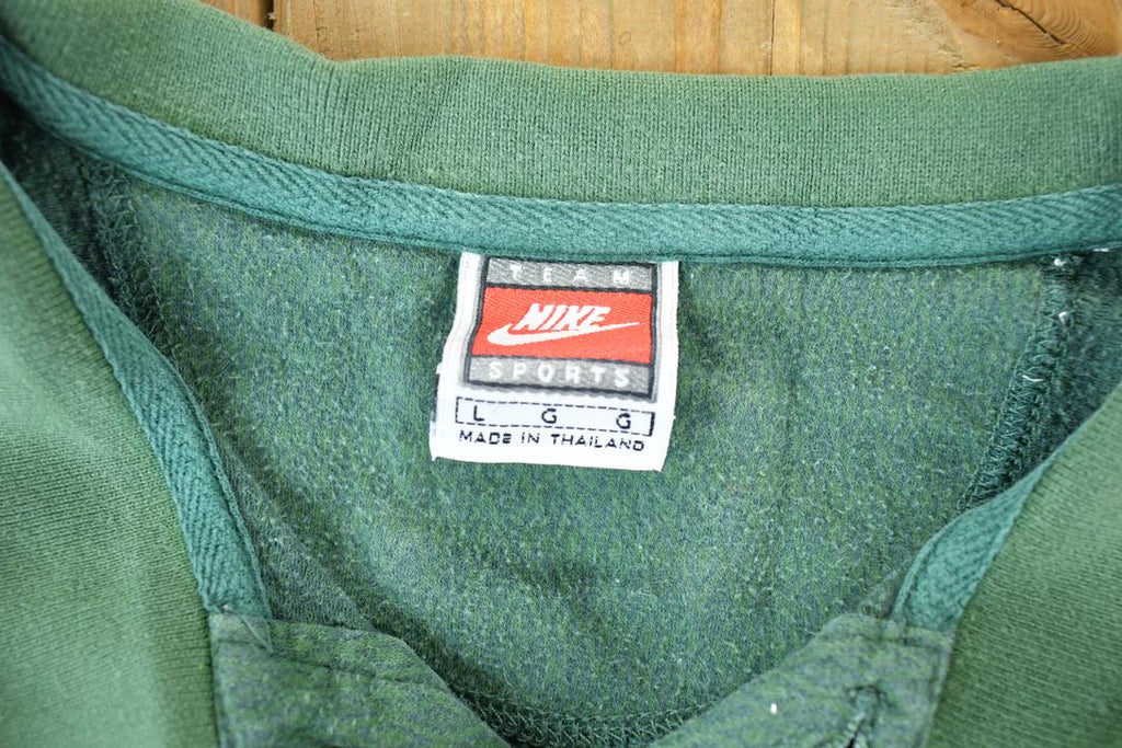 Vintage 1990s Nike Green Bay Packers NFL Graphic Polo Style Quarter Button Shirt