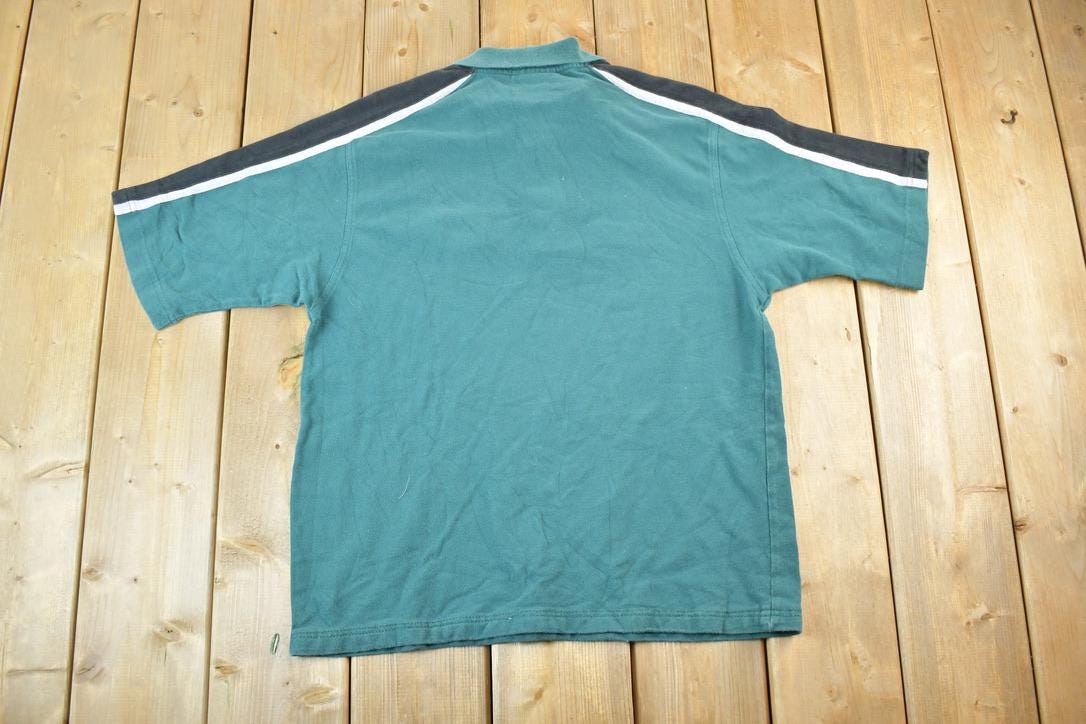 Vintage 1990s Philadelphia Eagles NFL Graphic Polo Style T-Shirt Made In USA