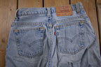 Vintage 1990s Levi's 550 Light Wash Jeans Size 28 x 31