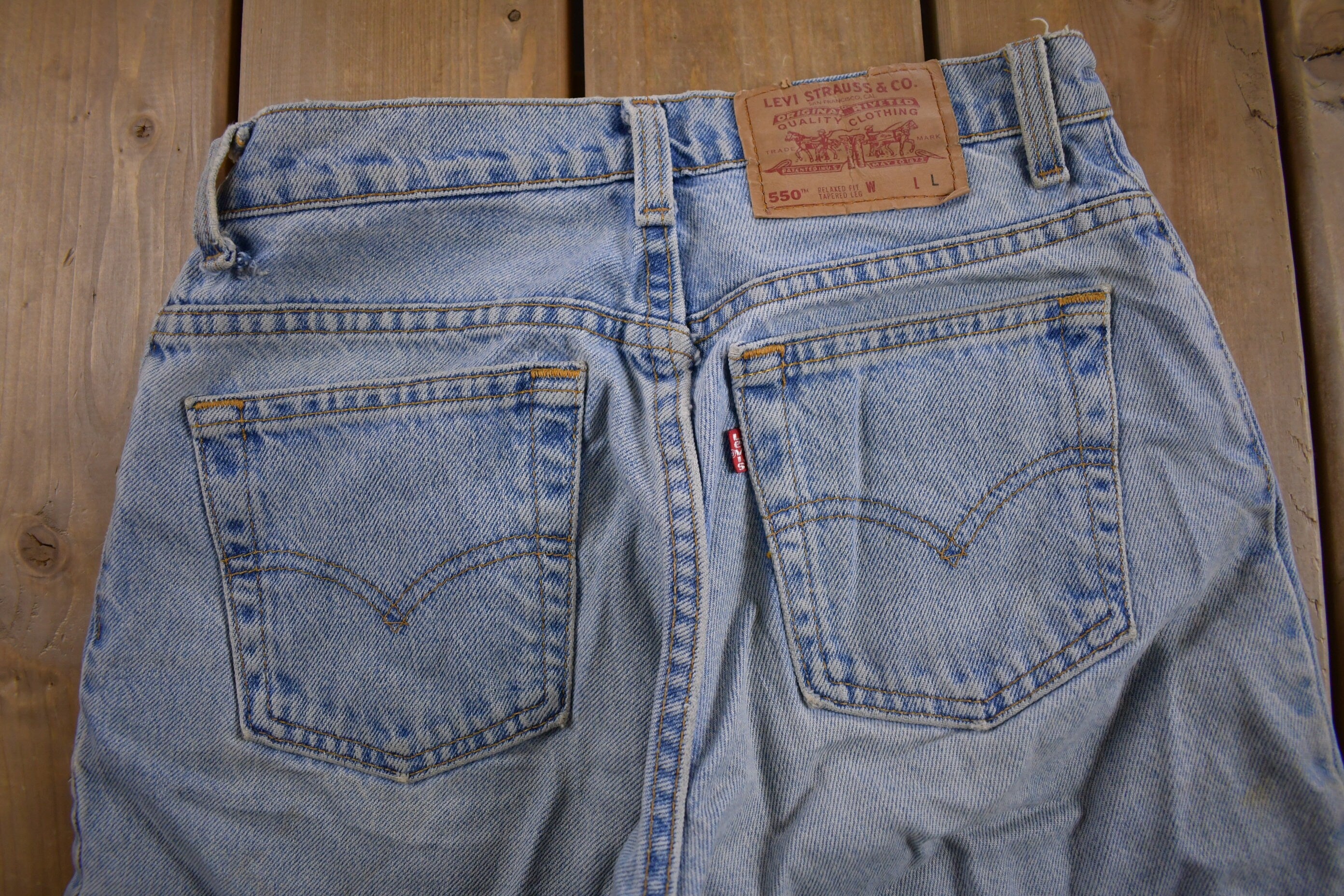 Vintage 1990s Levi's 550 Light Wash Jeans Size 28 x 31