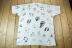 Vintage 1990s Animal Tracks All Over Print Graphic T-Shirt