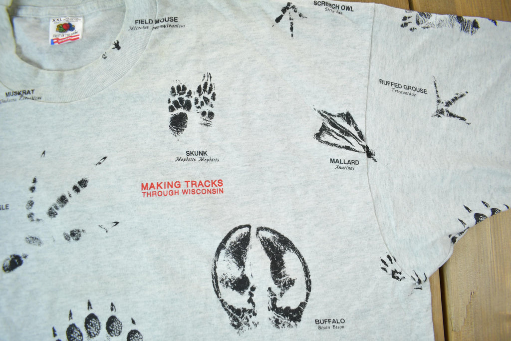Vintage 1990s Animal Tracks All Over Print Graphic T-Shirt