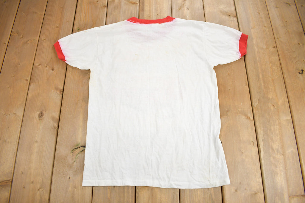 Vintage 1980s The Elliots A Family Tradition Graphic Ringer T Shirt