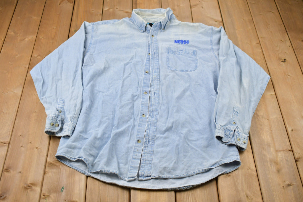 Vintage 1990s Tri-Mountain Nestle Embroidered Button Up Shirt