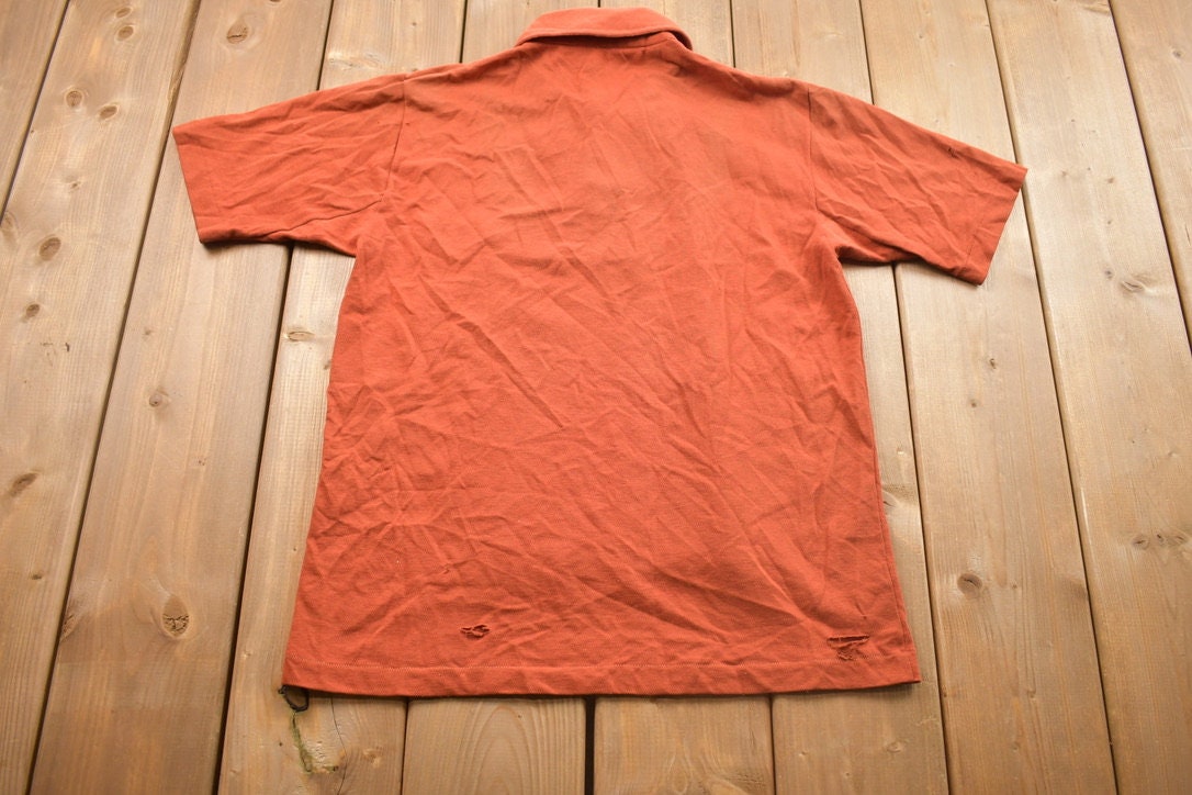 Vintage 1990s Grand Slam Munsingwear Button Up Collar Pocket T-Shirt