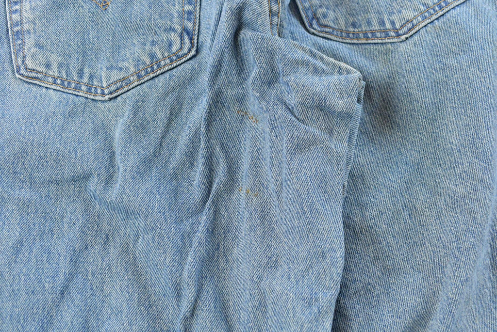 Vintage 1990s Levi's 560 Loose Fit Denim Blue Jeans Size 30 x 32 / 90s Levi's / Distressed Sun Faded Jeans / Made in USA / Streetwear