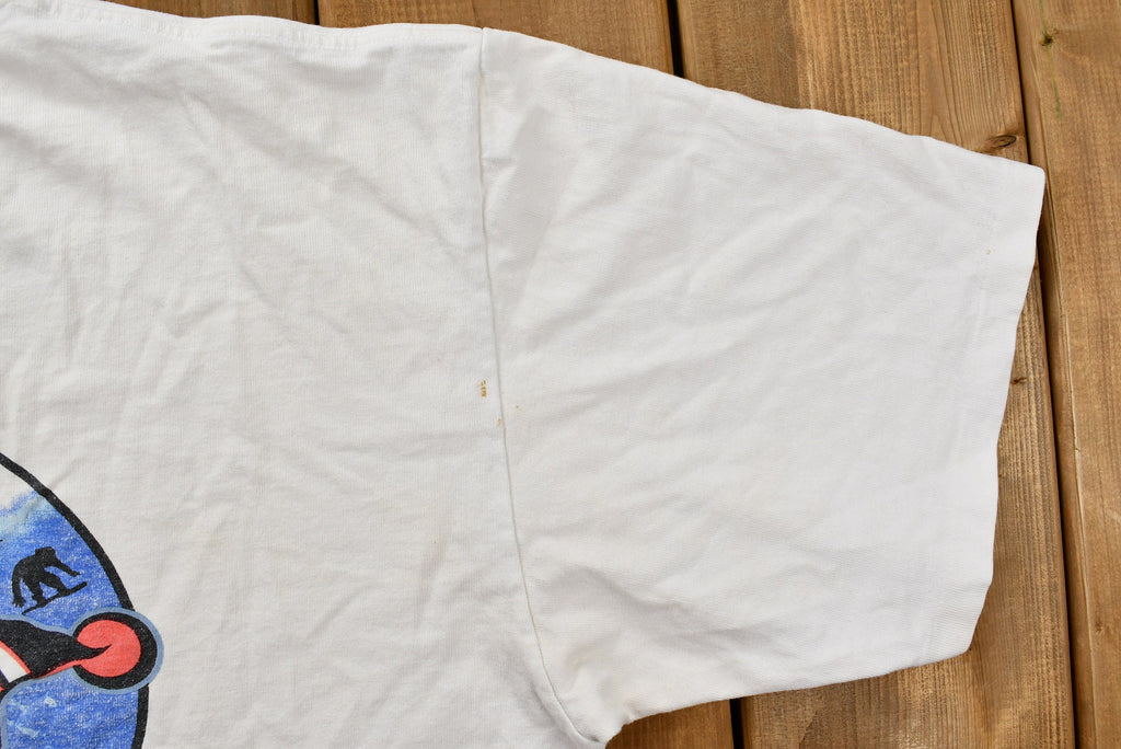 Vintage 1990s Distressed Crazy Frosty The Snowman Snowboarding T-Shirt