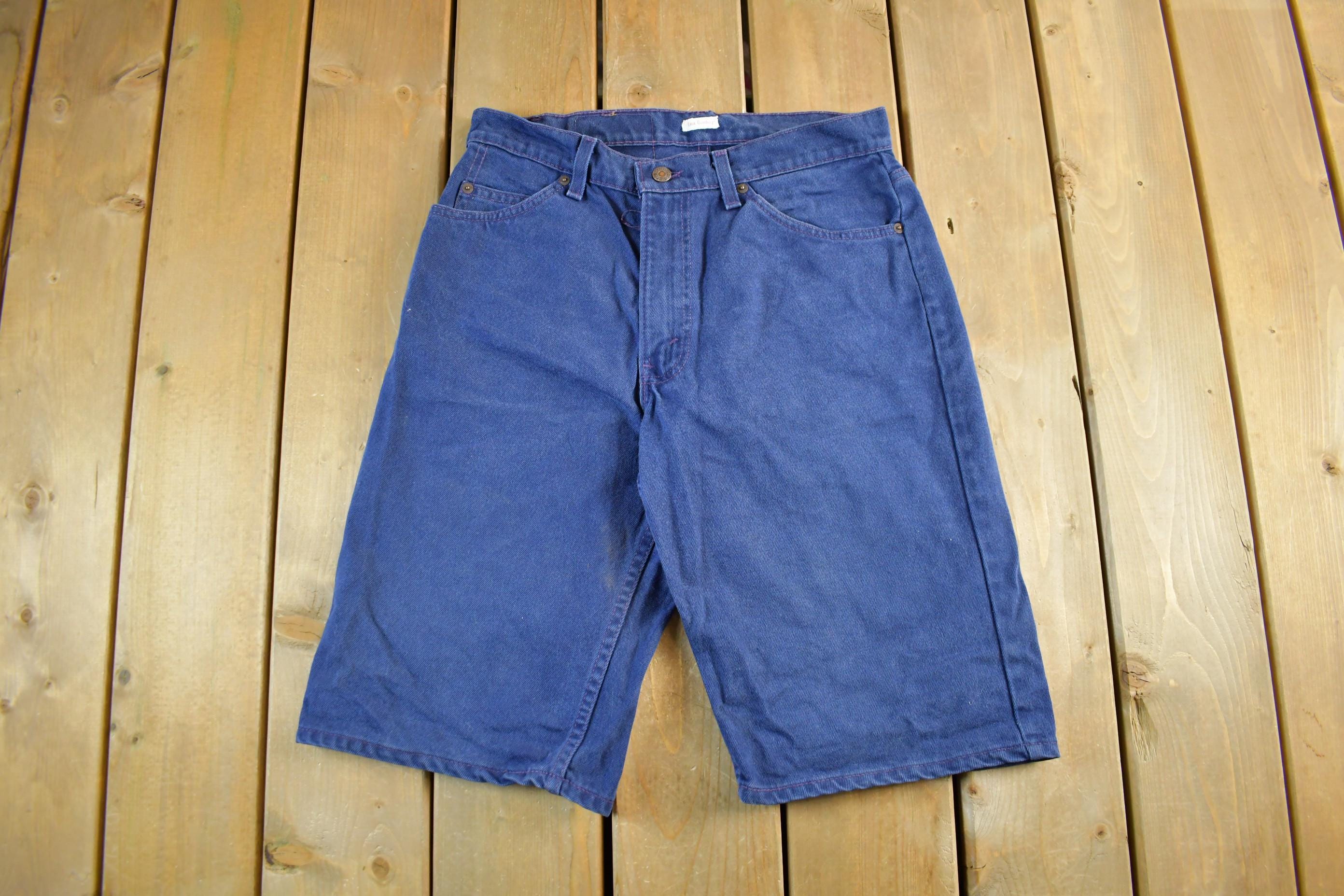 Vintage 1990s Levi's 560 Orange Tab Denim Jean Shorts 31
