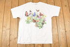 Vintage 1990s Multi Butterfly FAB Souvenir Outdoorsman T-Shirt Women's XL