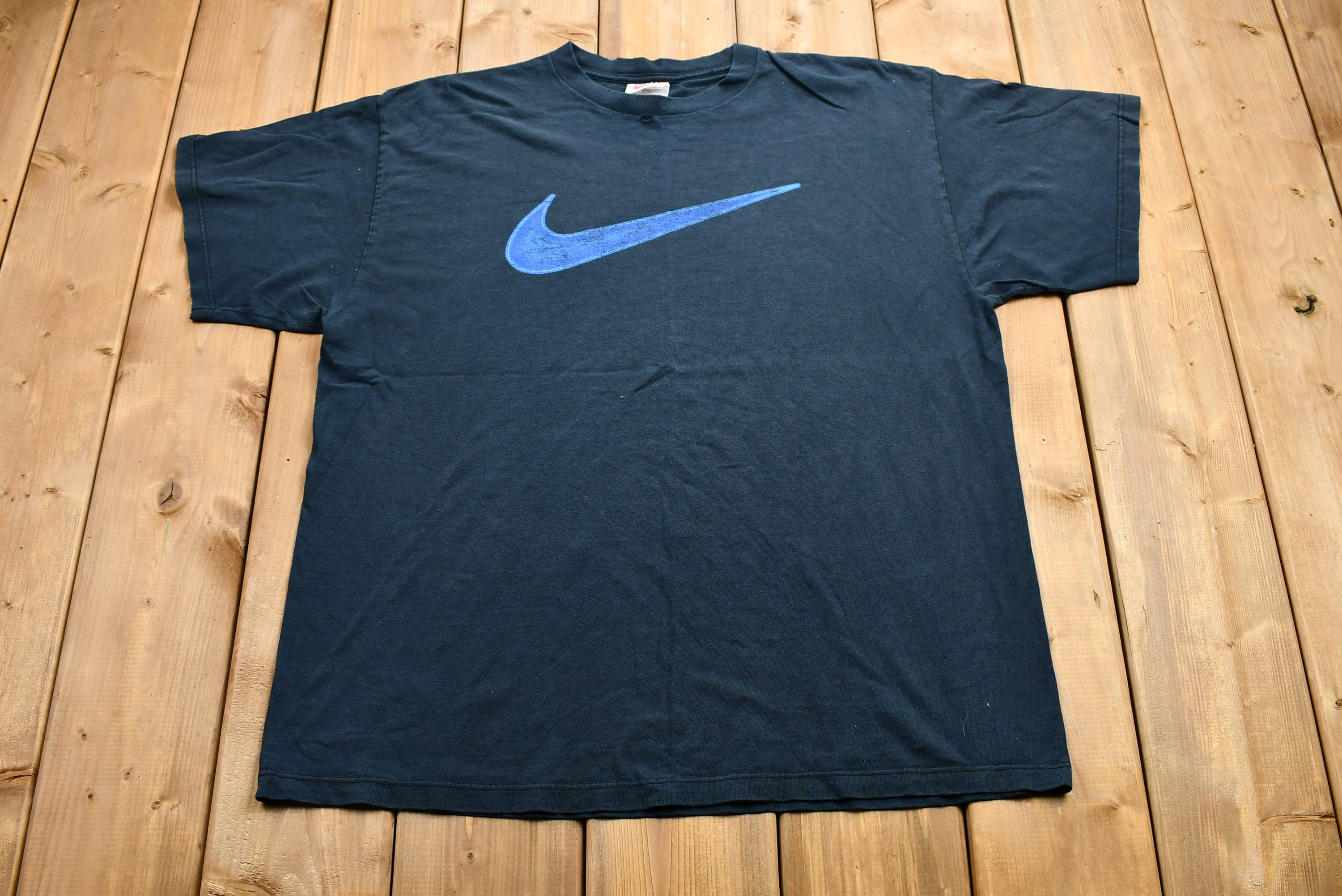 Vintage 1990s Distressed Nike Swoosh Graphic T-Shirt  90s Streetwear  Vintage Athleisure  Made in USA  Vintage Athleticwear