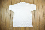 Vintage 1990s Worldweave Graphic T-Shirt