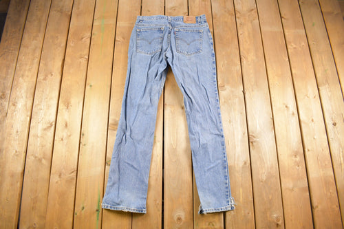 Vintage 1990s Levi's 505 Low Rise Distressed Denim Jeans Size 31 x 32
