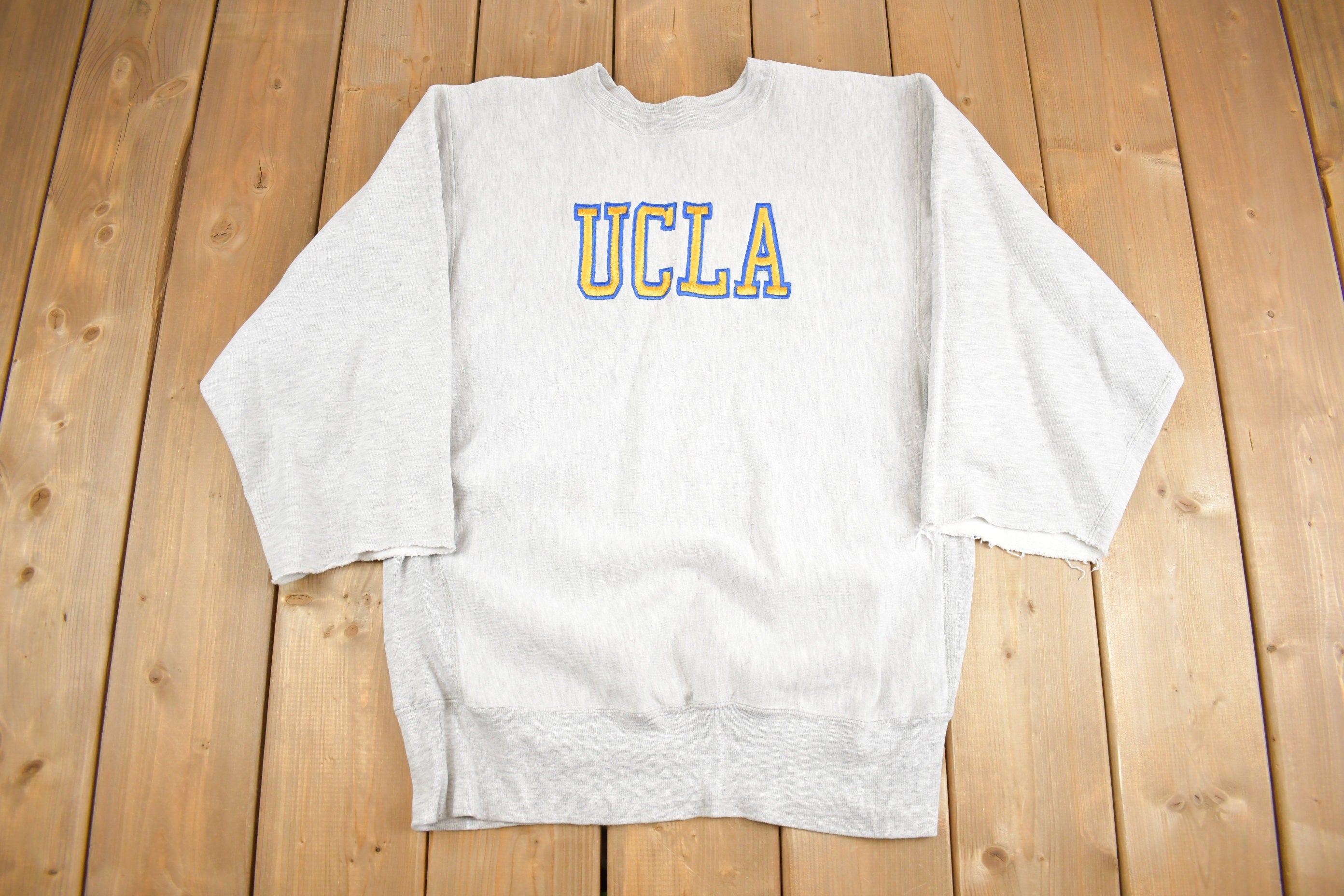 Vintage 1990s Distressed UCLA Champion Reverse Weave Sweatshirt  NCAA  Sportswear  Athleisure  Made in USA