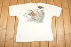 Vintage 1989 Harlequin Forest Animals FAB Outdoorsman Souvenir Travel T-Shirt Men's XL