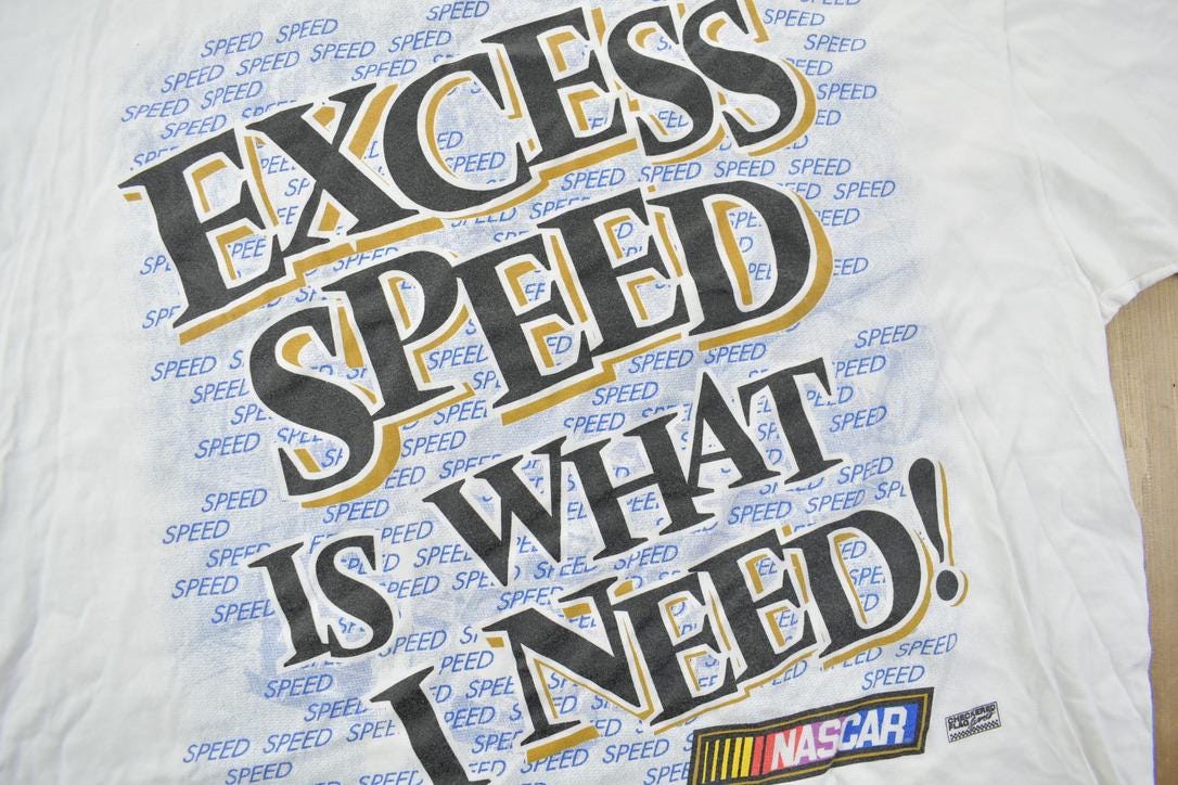 Vintage 1990s Excess Speed Is What you Need NASCAR All Over Print Racing Graphic T-Shirt