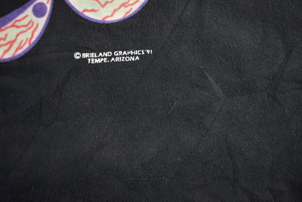 Vintage 1990s Brieland Graphics Glow In The Dark Eyes T-Shirt Men's Large