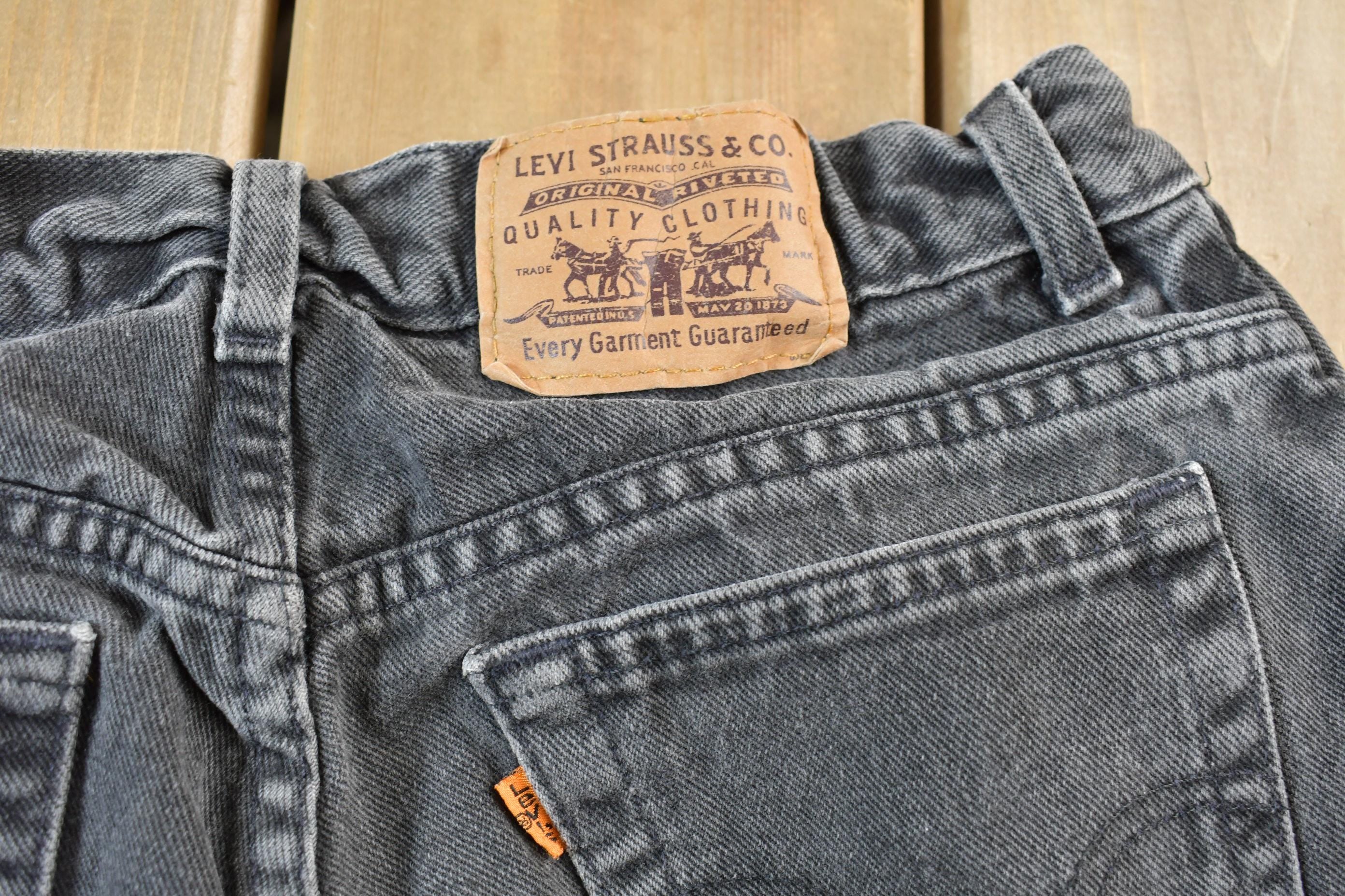 Vintage 1990s Levi's 550 Orange Tab Jeans Size 28 x 28.5