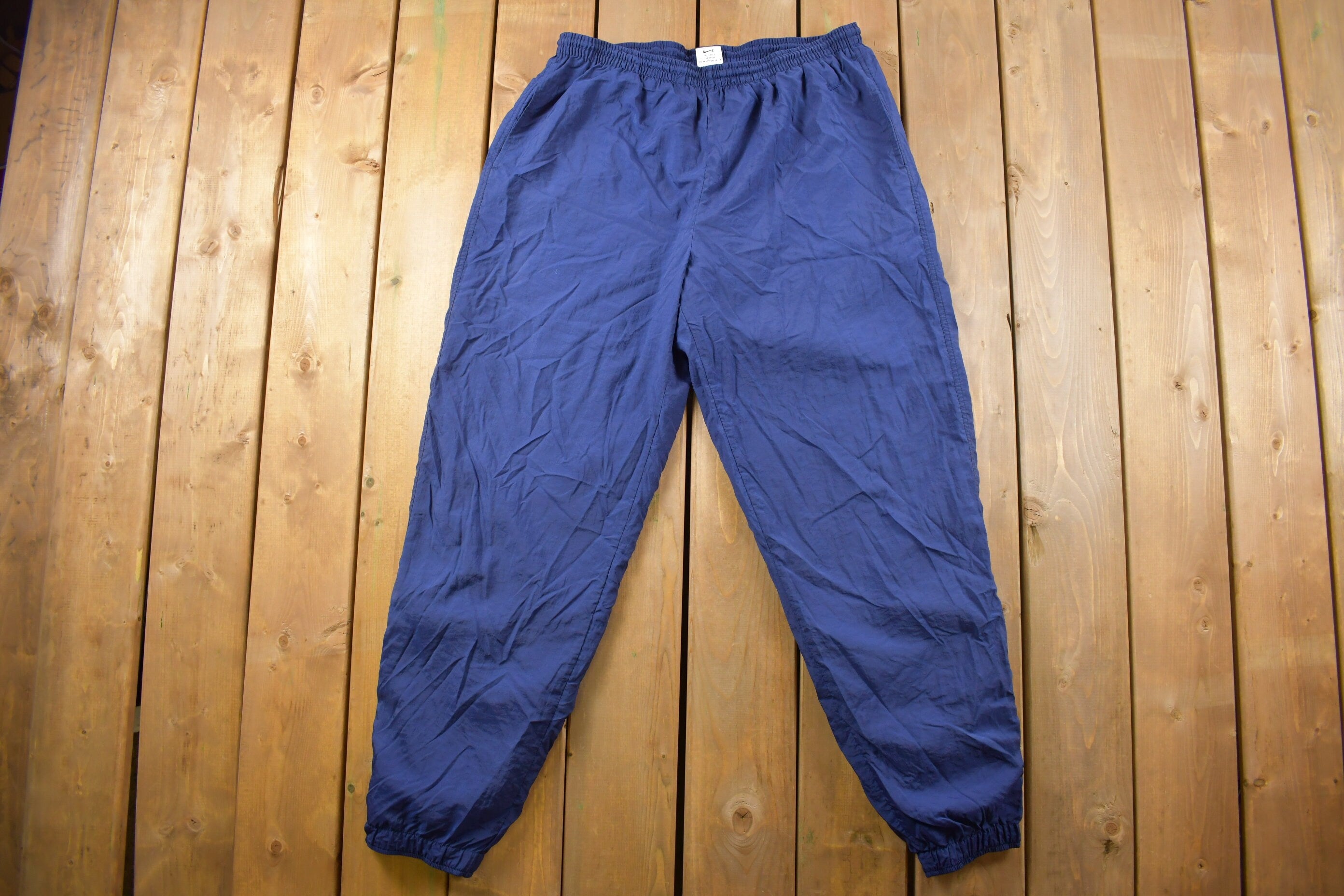 Vintage 1990s Blue Nike Mini Swoosh Windbreaker Pants Size XL