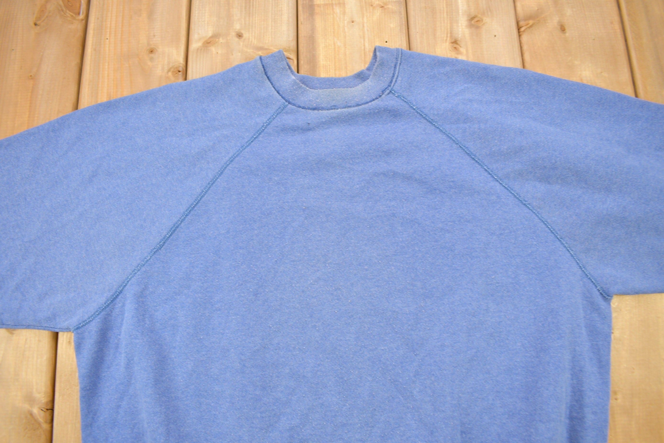Vintage 1980s Tultex Sun Faded Blue Blank Raglan Crewneck Sweatshirt