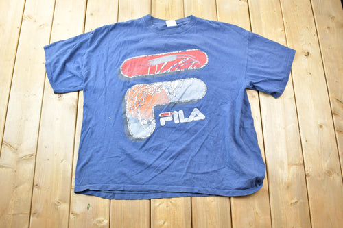 Vintage 1990s Fila Distressed Graphic T-Shirt / Vintage T Shirt / Streetwear / Graphic Tee / Single Stitch / Made In USA