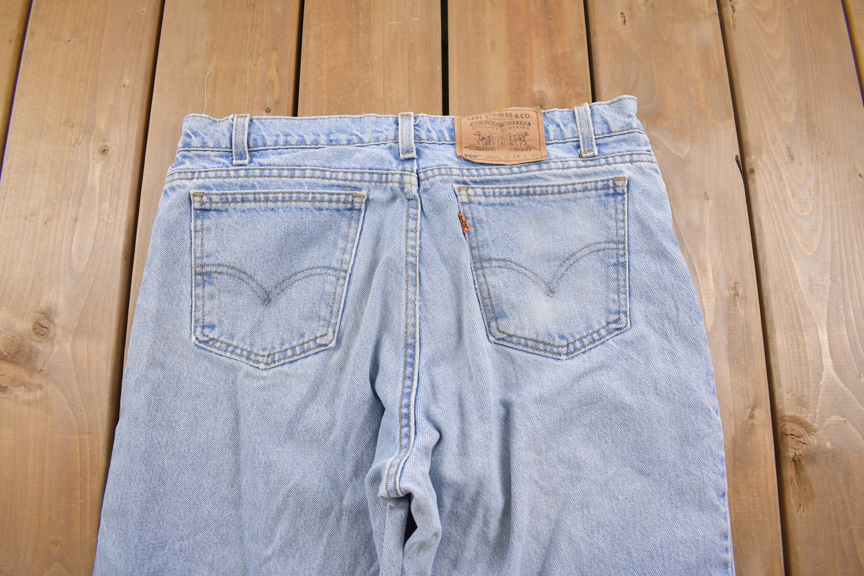 Vintage 1990s Levi's 560 Orange Tab Jeans Size 33 x 31