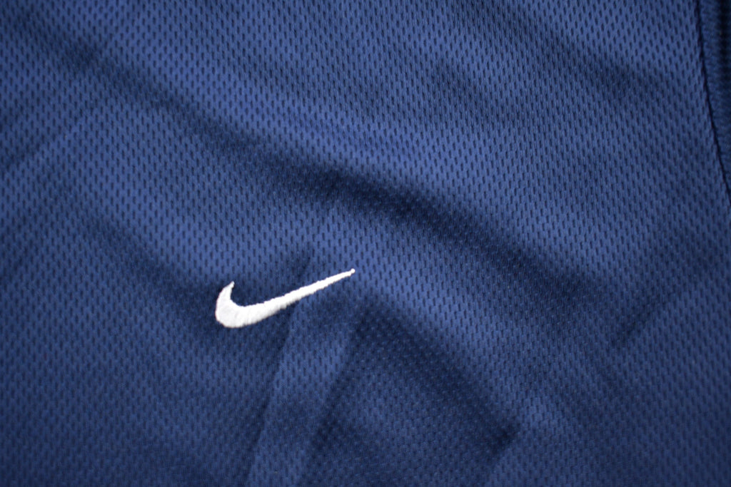 Vintage 1990s Nike Embroidered Swoosh Graphic T-Shirt