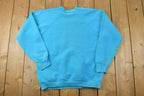 Vintage 1990s Wyoming Howling Moose Crewneck Sweatshirt
